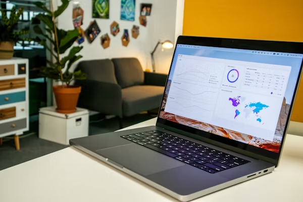 Laptop screen displaying detailed email marketing analytics for campaigns